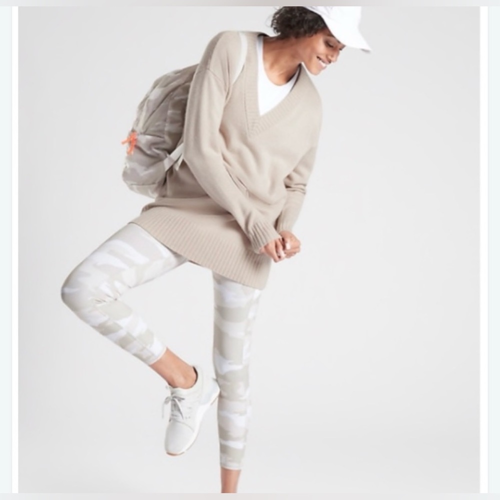 Athleta Elation High Rise 7/8 Tights in a tan camouflage pattern.
